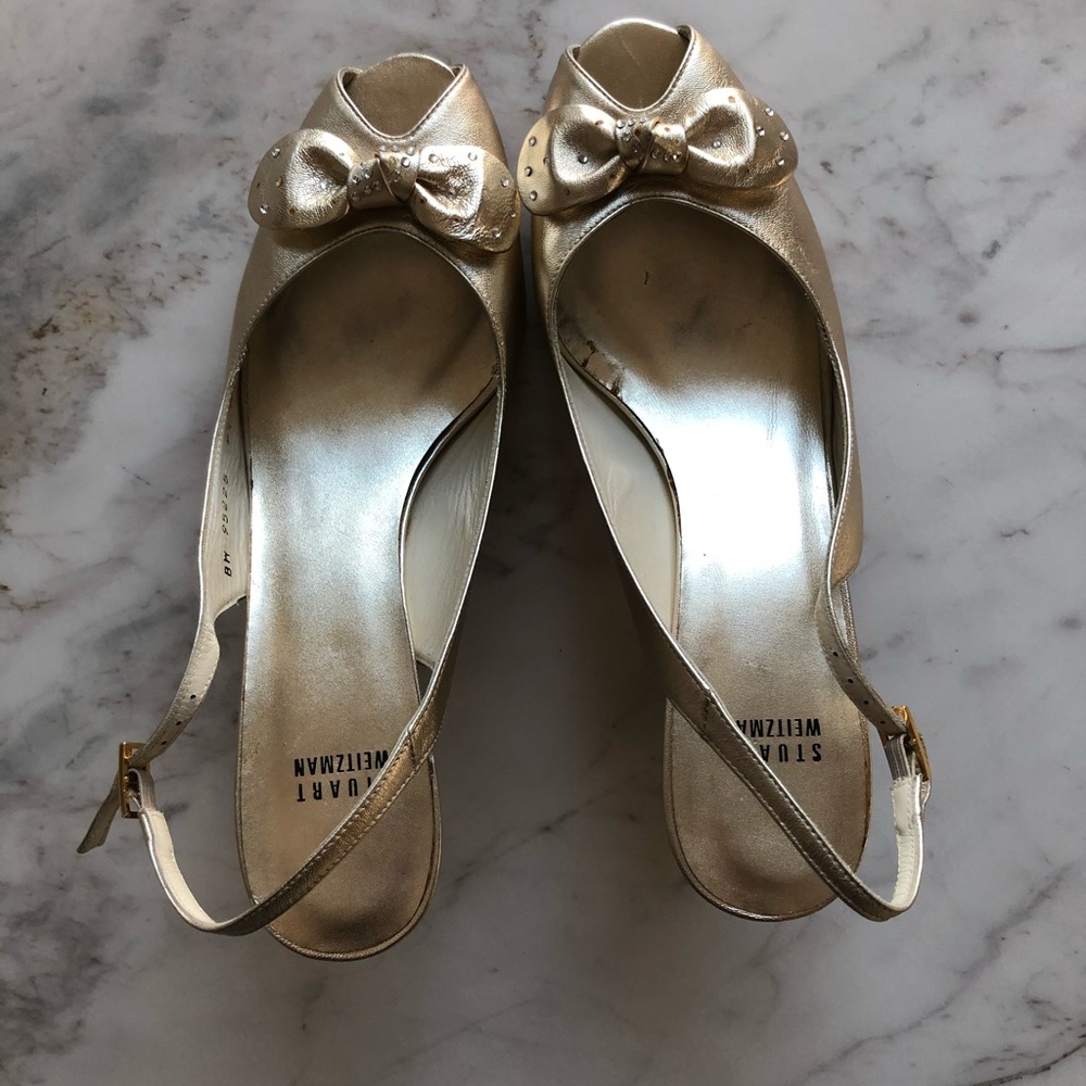 Size 9.5 gold Stuart Weitzman peep toe slingbacks